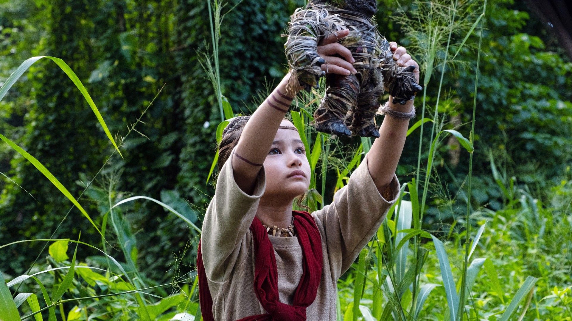 https://static0.srcdn.com/wordpress/wp-content/uploads/2026/07/jia-looks-up-towards-purple-light-and-raises-her-hand-in-godzilla-vs-kong-1.jpg?q=70&fit=crop&w=1600&h=900&dpr=1