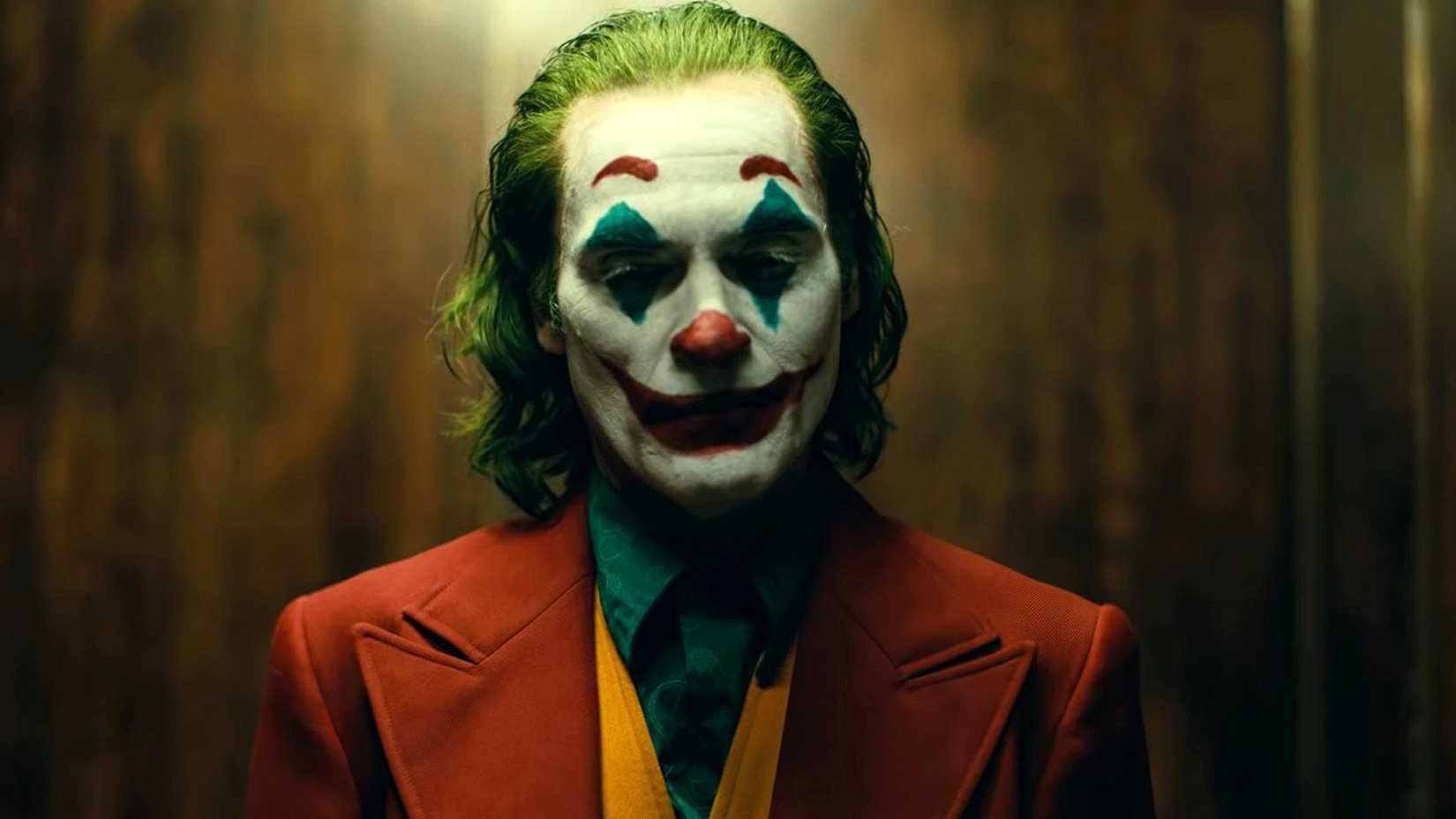 Joaquin Phoenix as The Joker wearing his makeup in Joker
