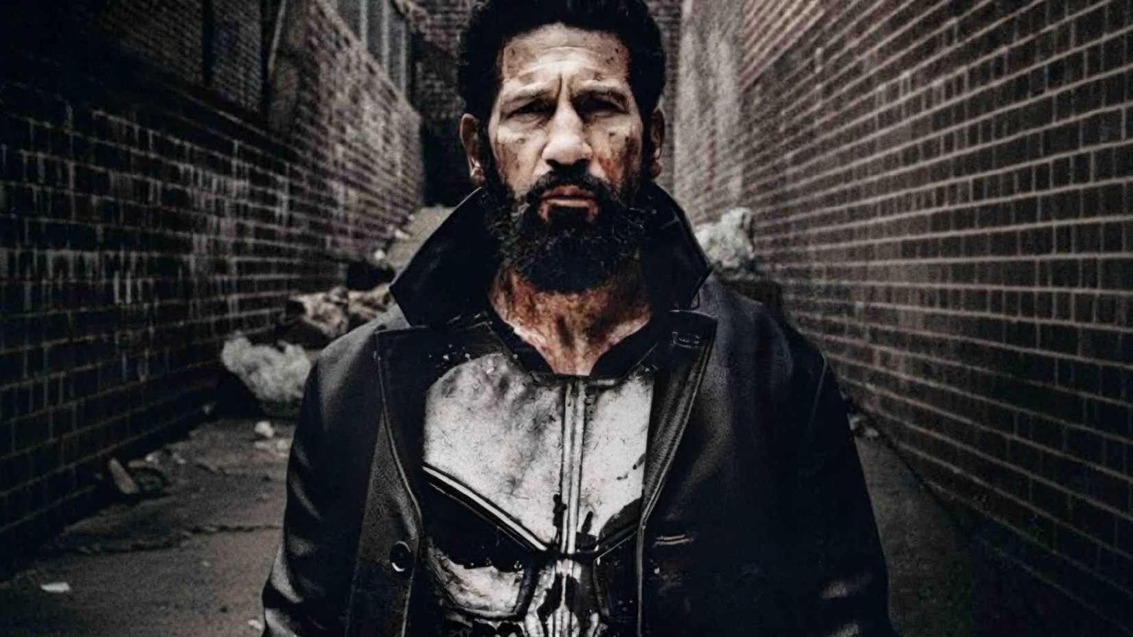 Jon Bernthal's Frank Castle stands in an alley in The Punisher One Last Kill