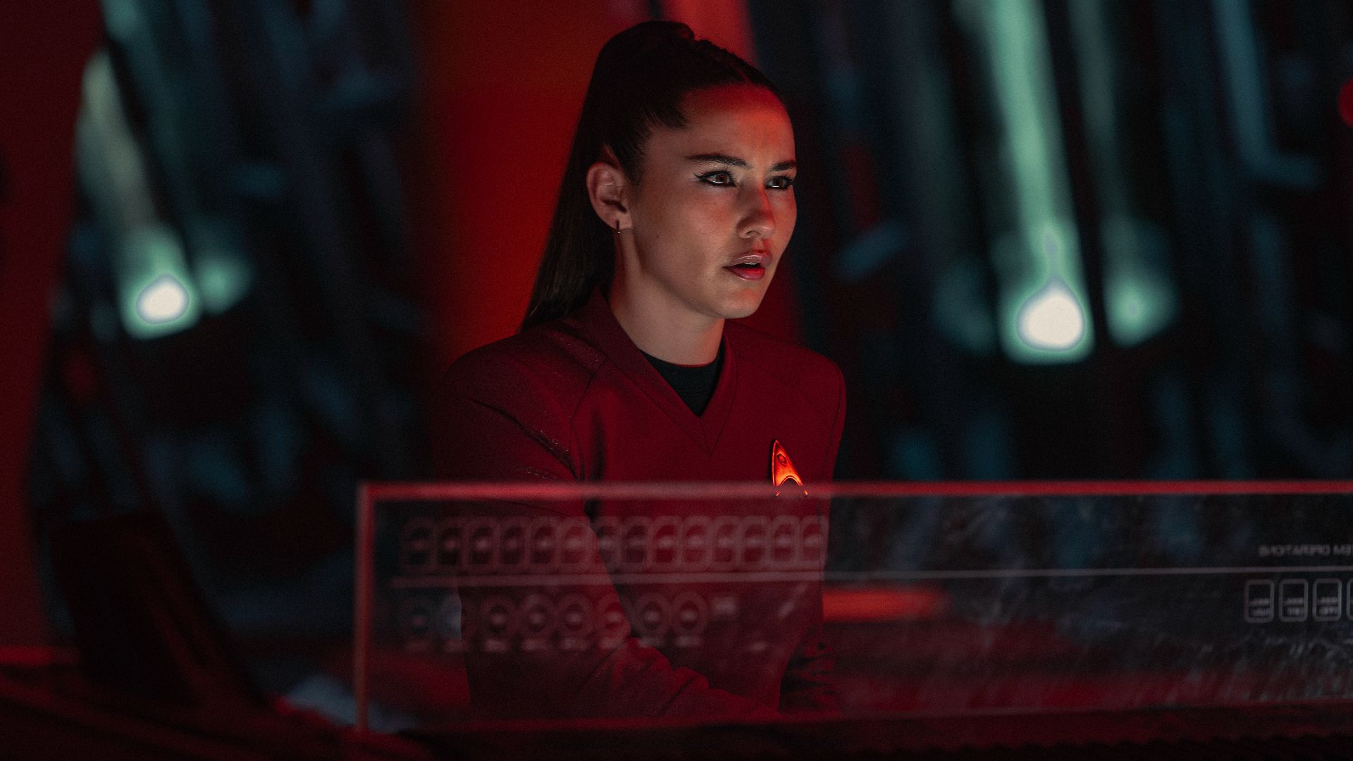 La'an at a console looking intense