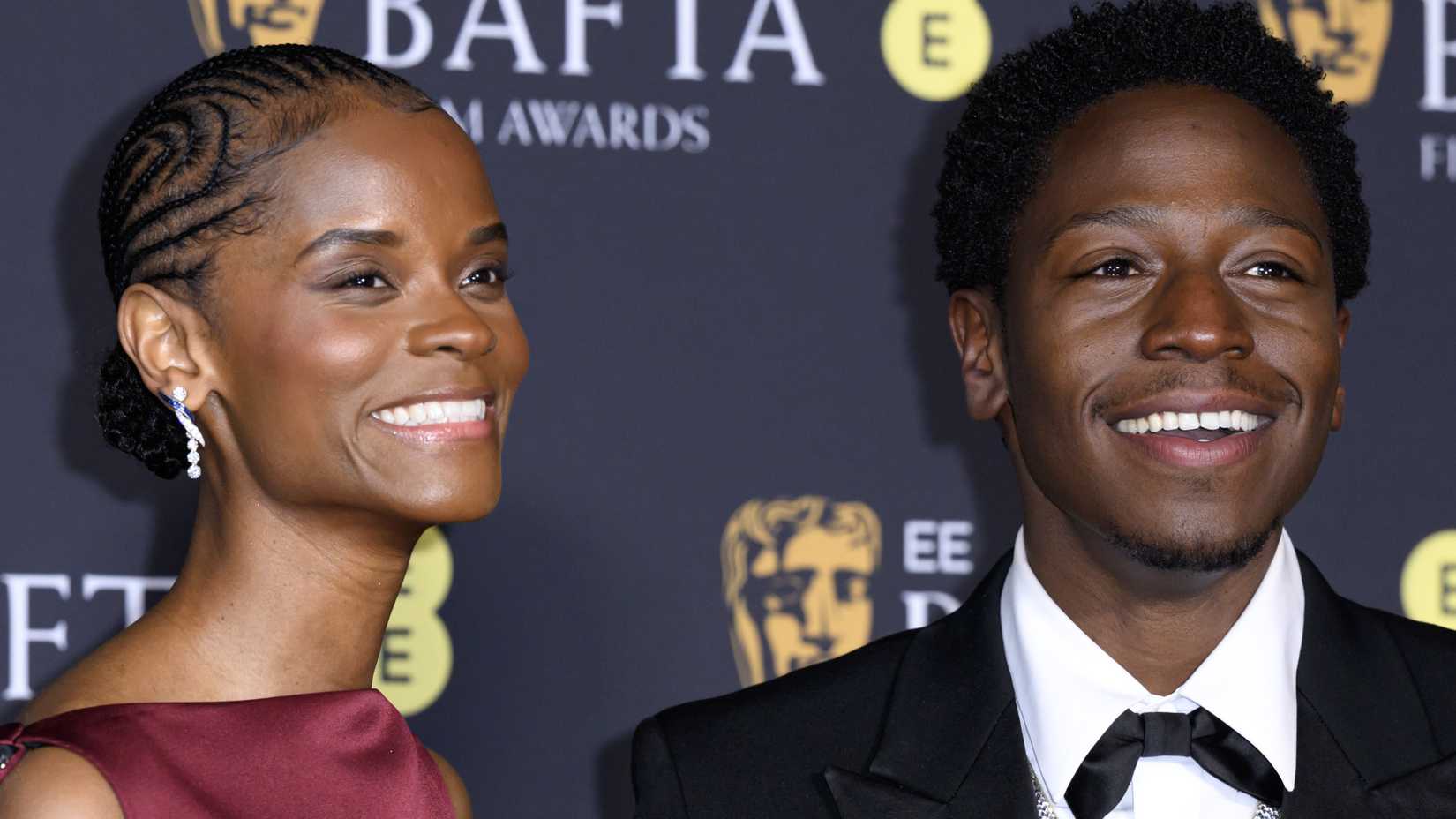 Letitia Wright and David Jonsson smiling at the 2025 EE BAFTA Film Awards