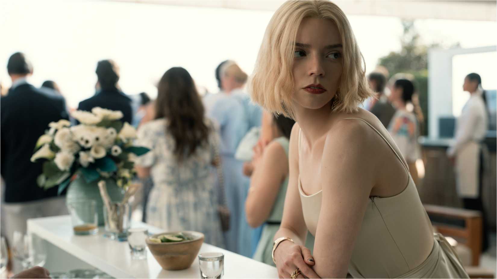Lucky (Anya Taylor-Joy) at a fancy party in Lucky