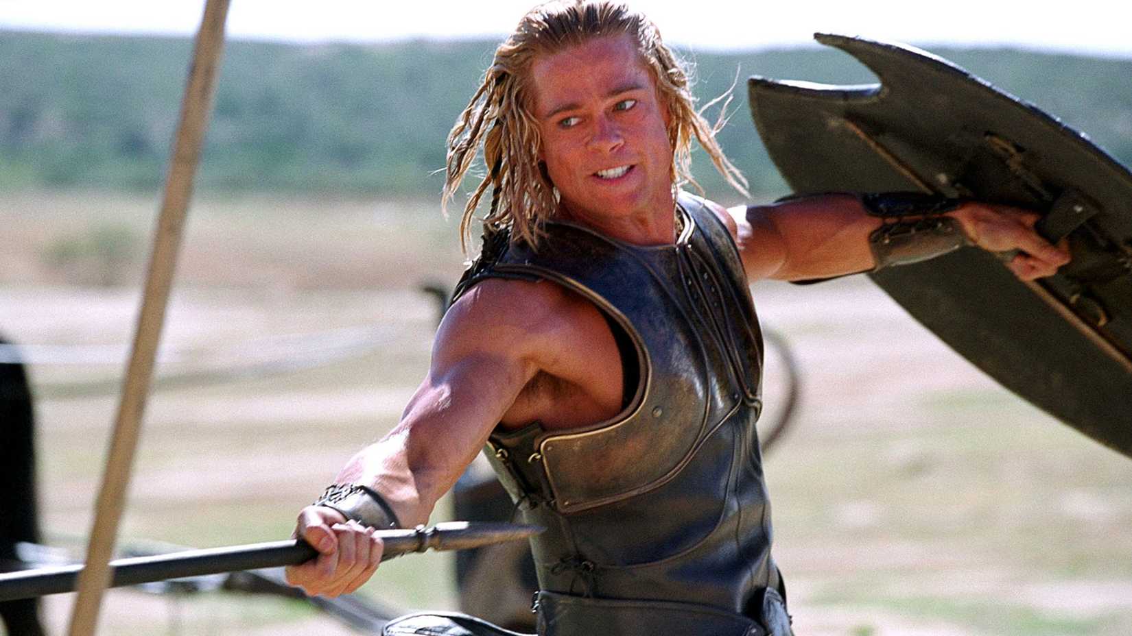 Achilles (Brad Pitt) wielding a sword and shield in Troy.