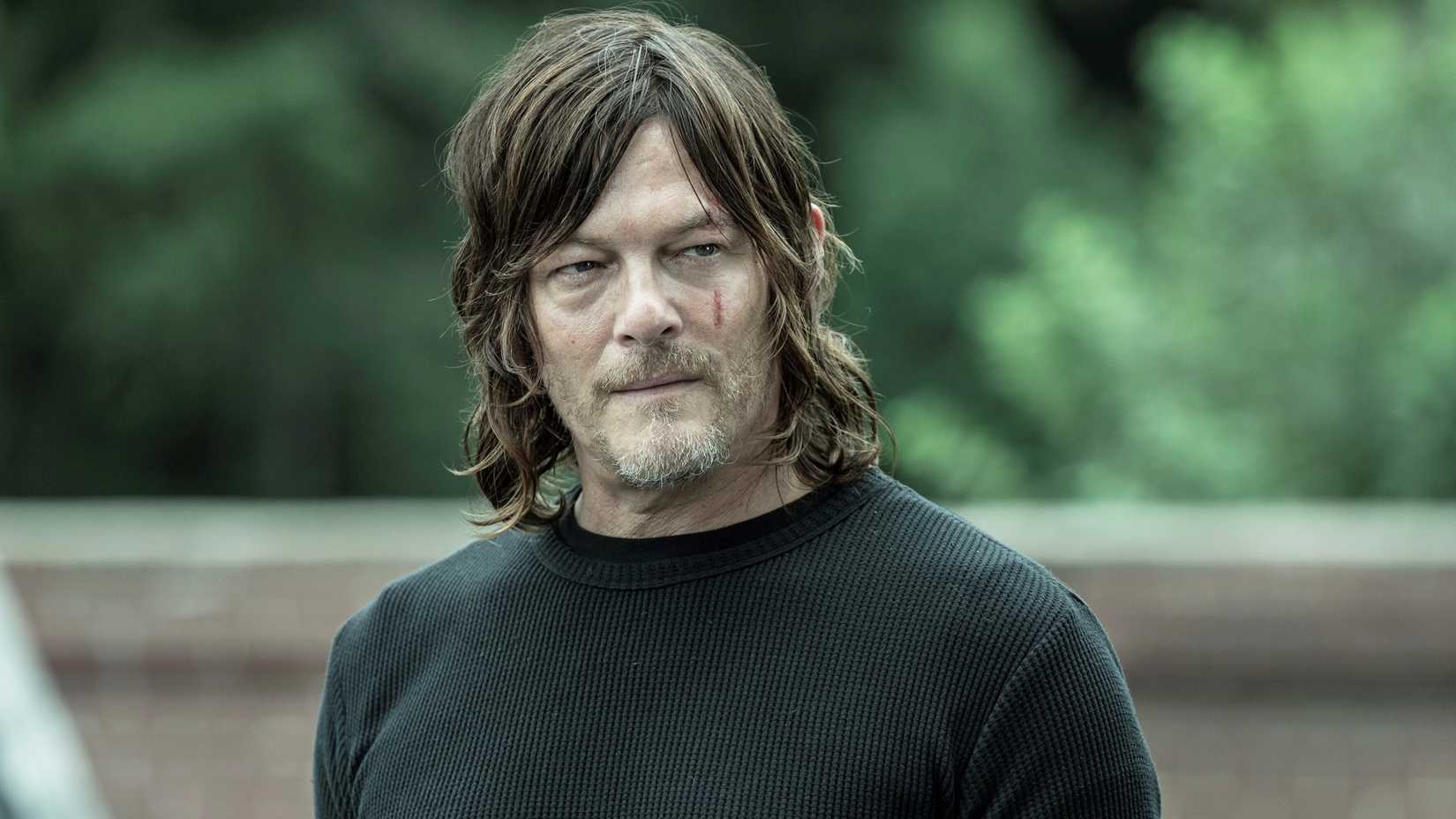 Norman Reedus as Daryl, looking at the camera, in a still from The Walking Dead