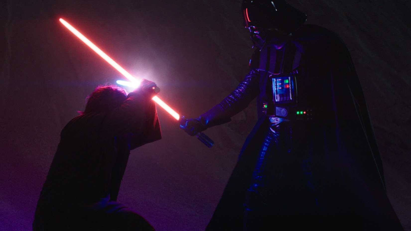 Obi-Wan Kenobi (Ewan McGregor) and Darth Vader (Hayden Christensen) crossing lightsaber blades in Obi-Wan Kenobi episode 3