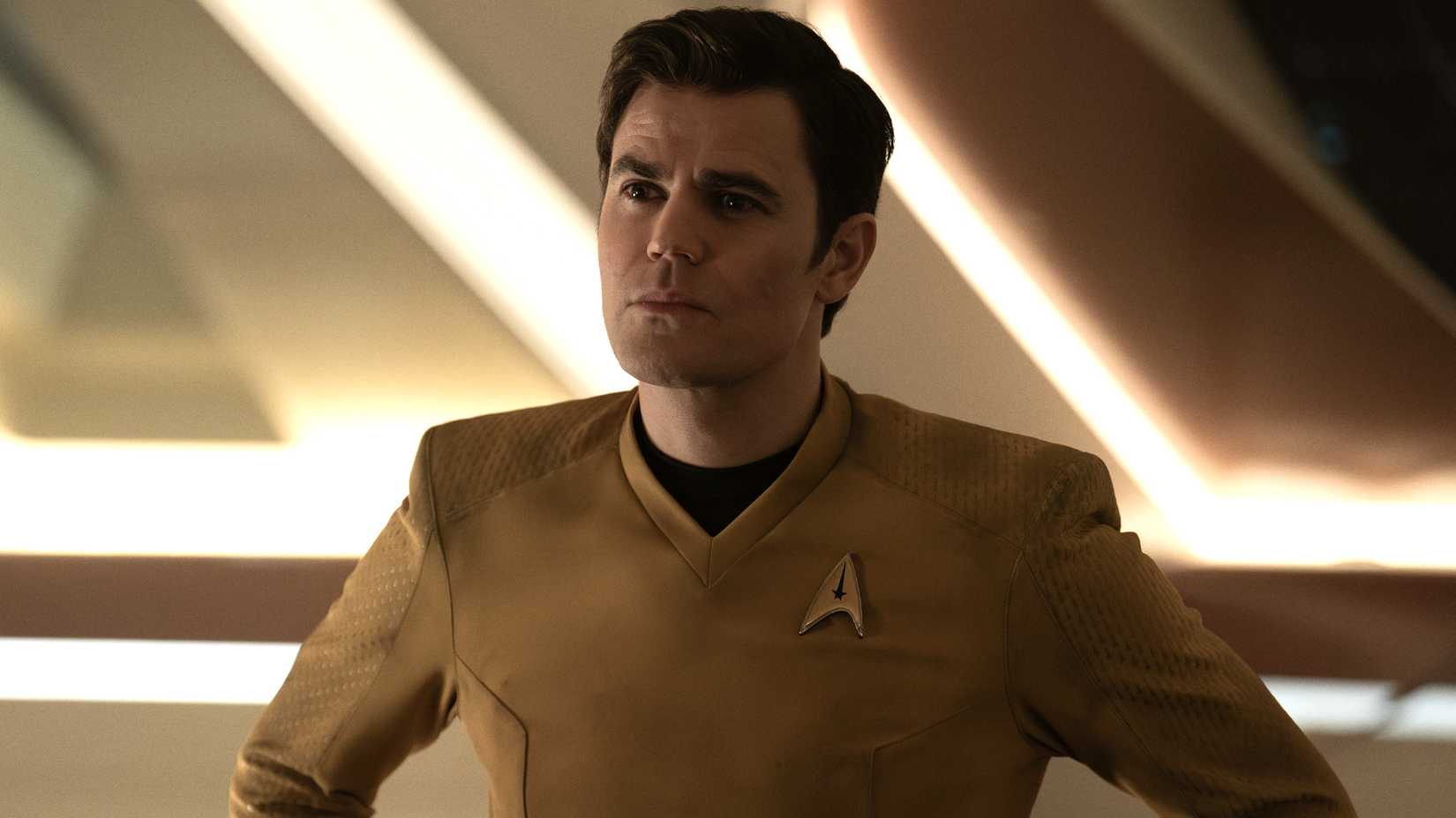 Paul Wesley hands on hips as Kirk