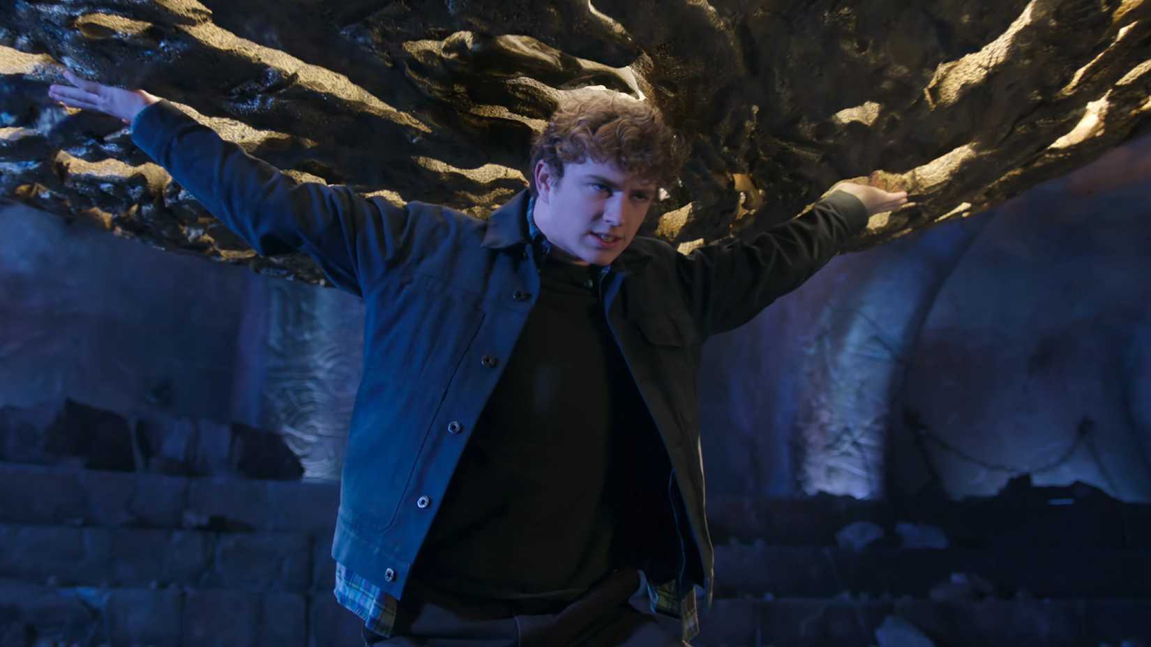Percy Jackson holding up the Titan's Curse in season 3