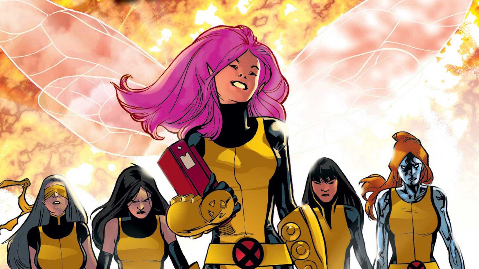 Pixie smiles in front of the team in an XMen comic