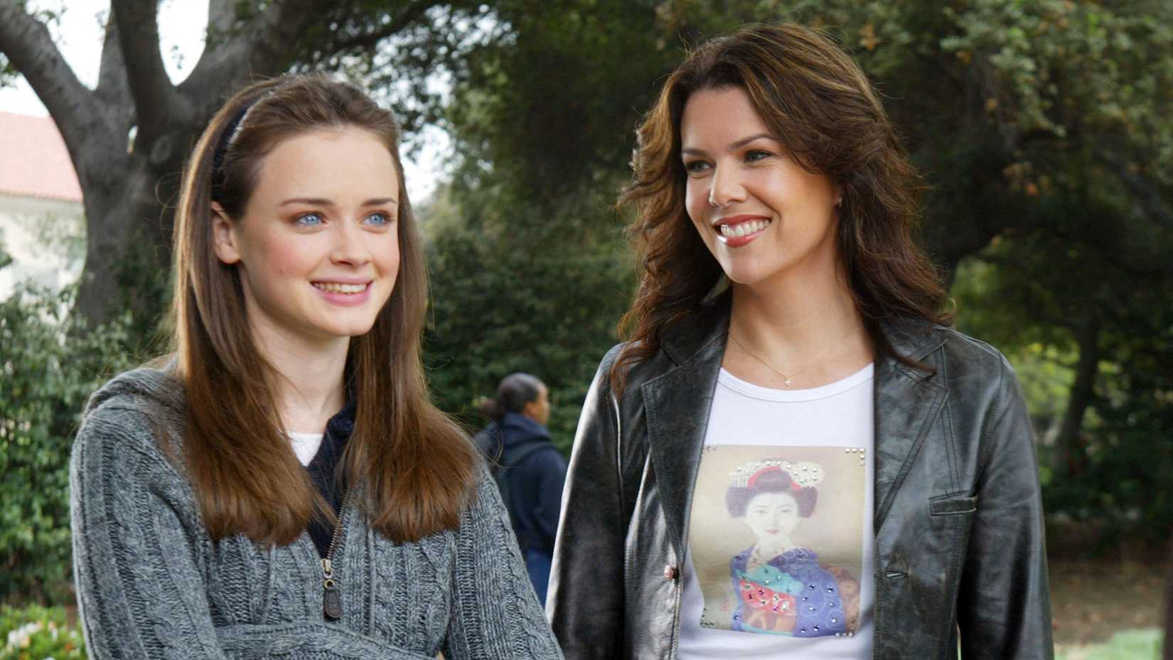 Rory and Lorelai smiling together in Gilmore Girls