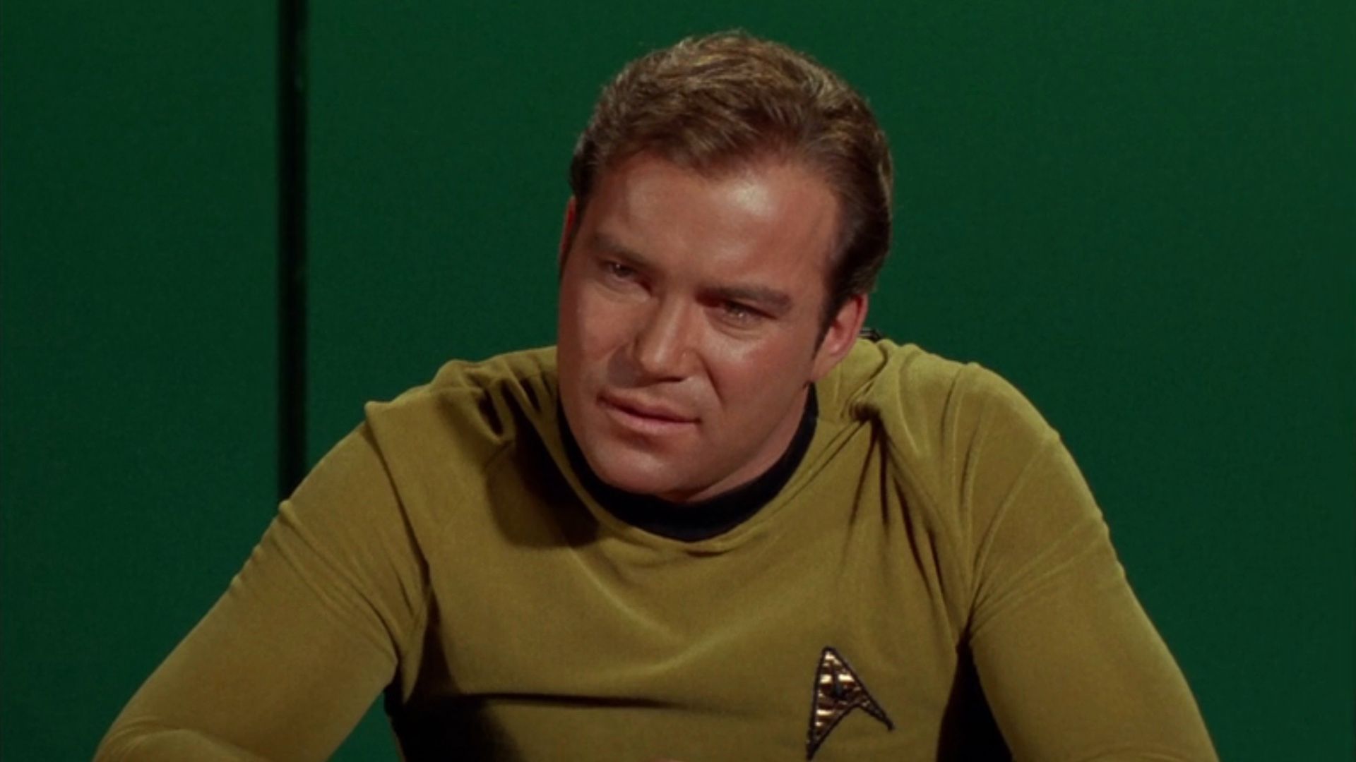 Kirk giving passionate speech in an Enterprise meeting room