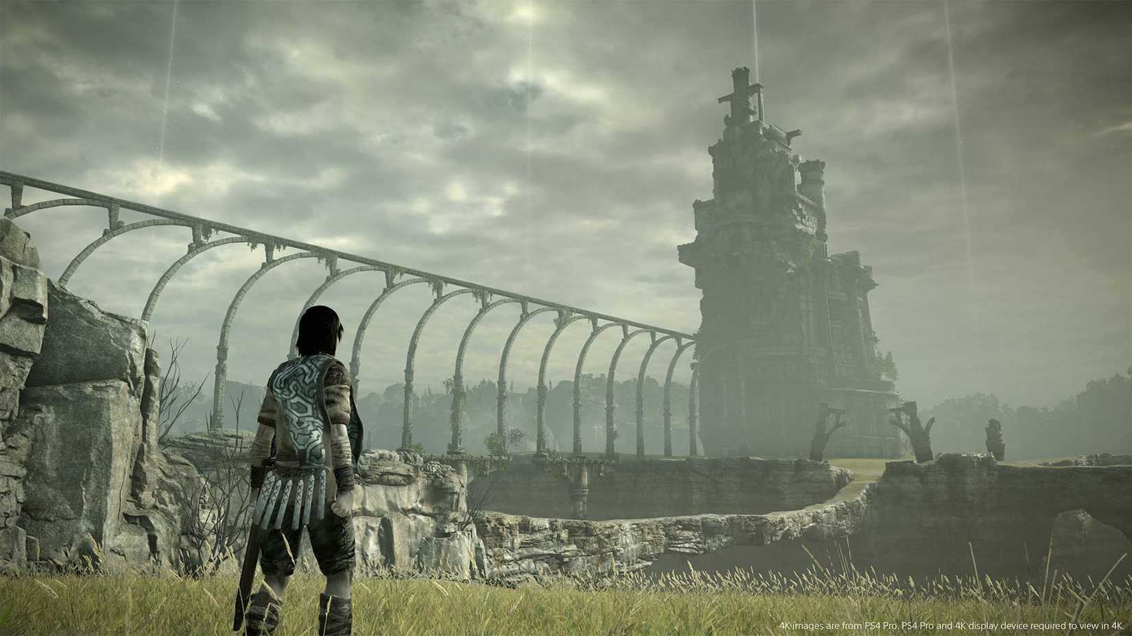 The protagonist looking at a distant structure in Shadow of the Colossus.
