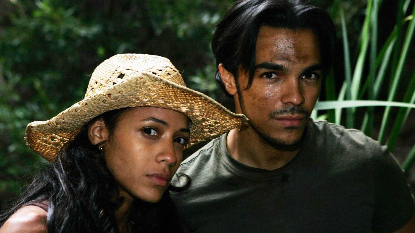 Maya and Alejandro standing in a South American jungle