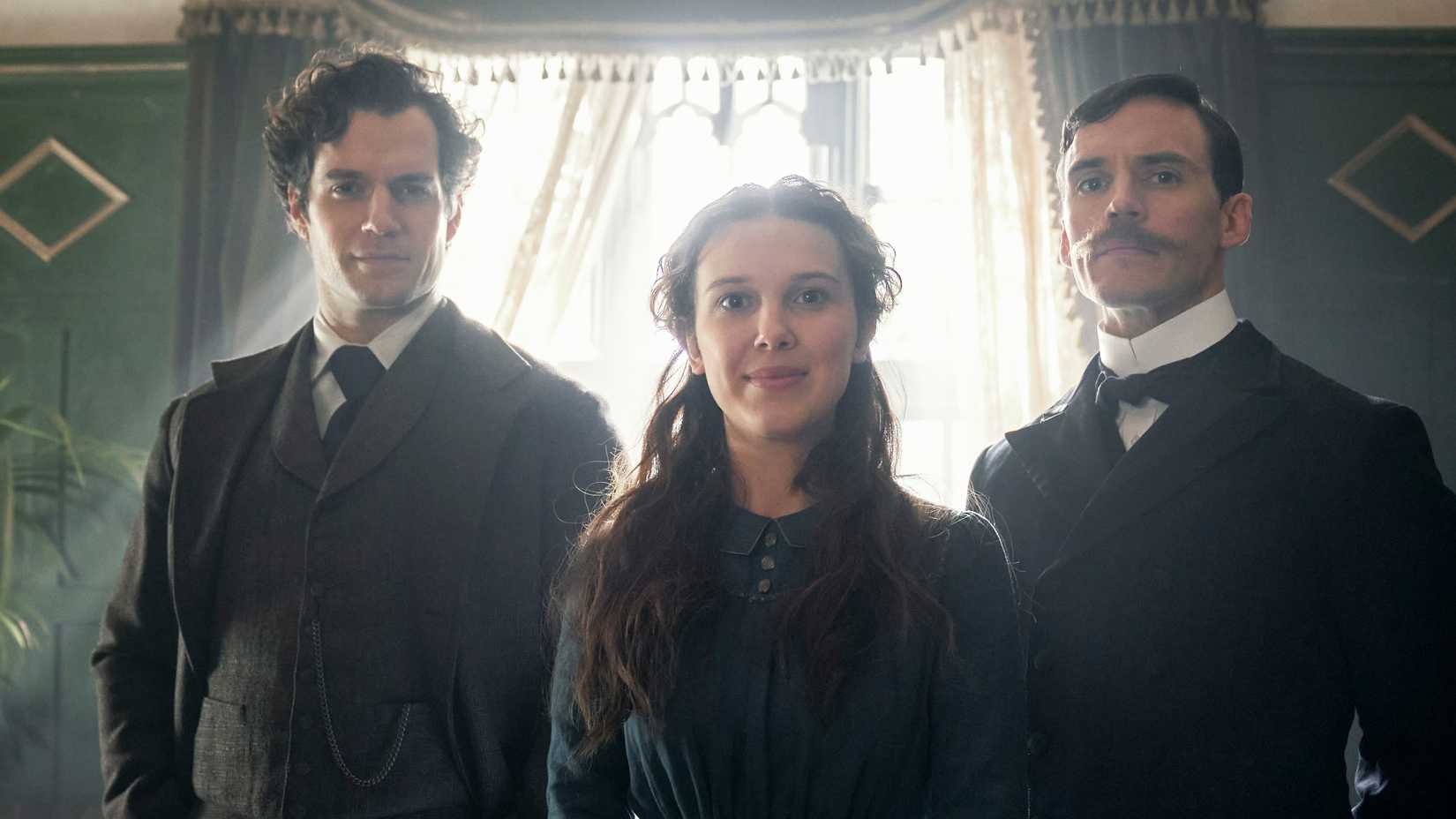 ENOLA HOLMES (L to R) HENRY CAVILL as SHERLOCK HOLMES, MILLIE BOBBY BROWN as ENOLA HOLMES, SAM CLAFLIN as MYCROFT HOLMES. Cr. ROBERT VIGLASKI /LEGENDARY &copy;2020