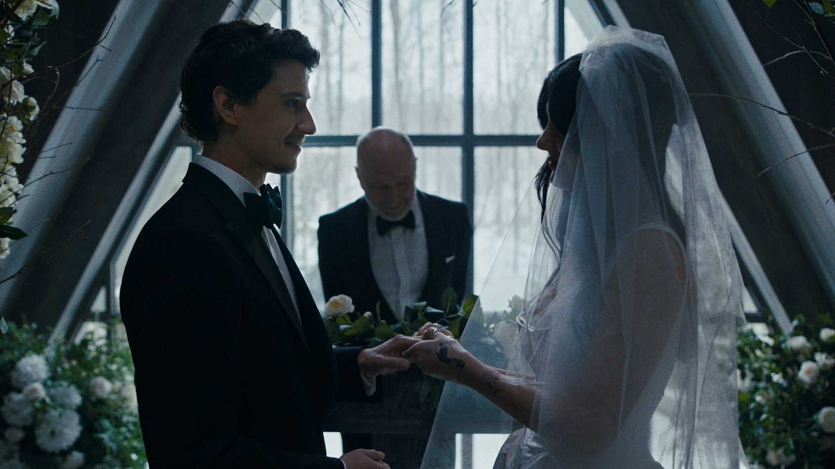 Nicky and Rachel hold hands at the altar in Something Very Bad Is Going to Happen's finale