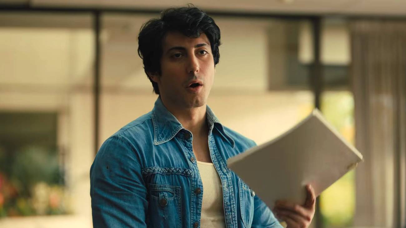Stallone holding up his script in I Play Rocky
