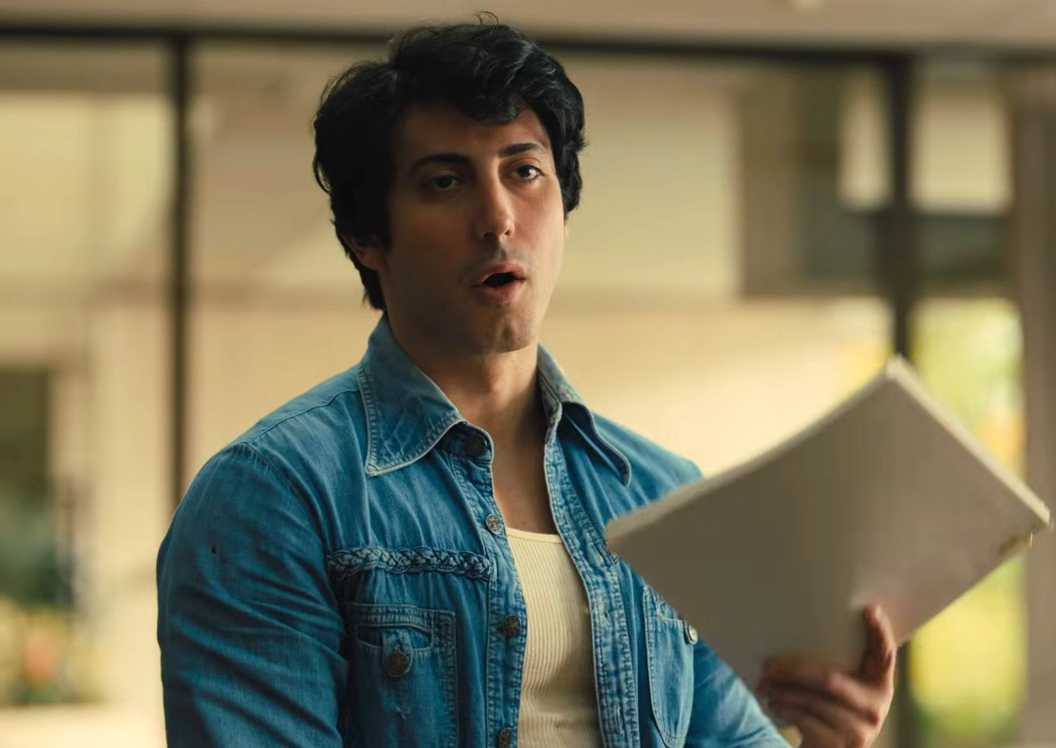 Stallone holding up his script in I Play Rocky