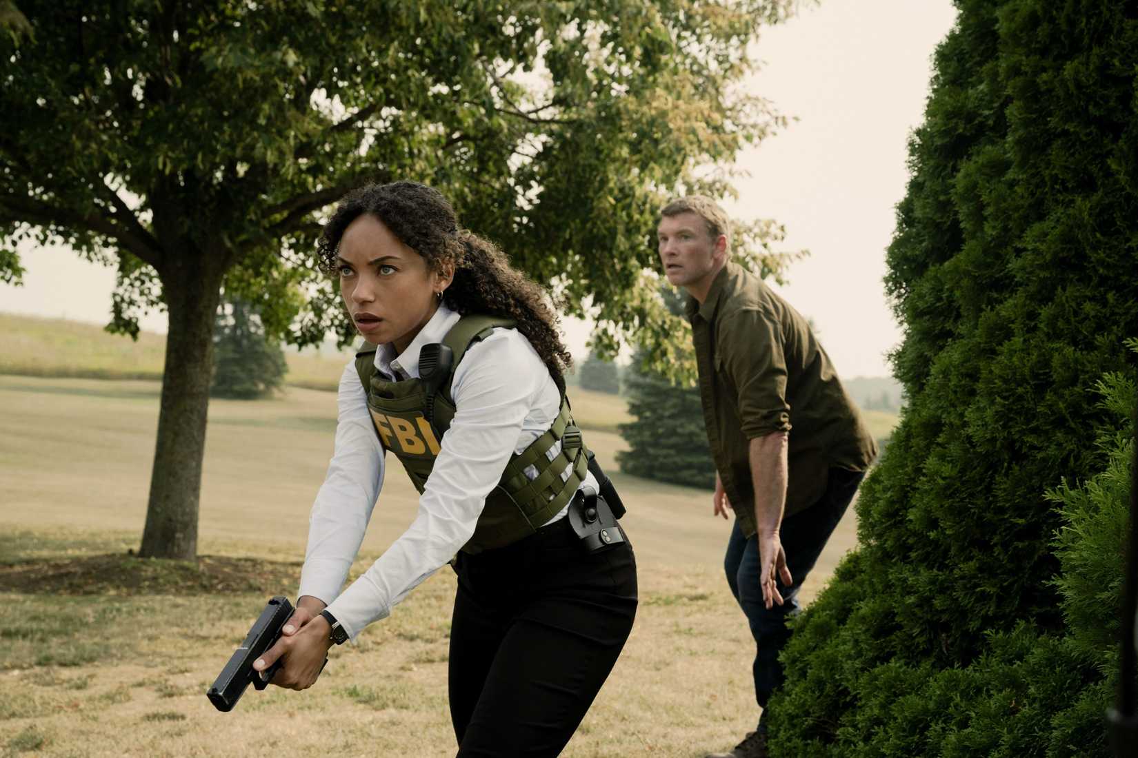 I WILL FIND YOU, (aka HARLAN COBEN'S I WILL FIND YOU), from left: Sam Worthington, Logan Browning, (Season 1, ep. 108, aired June 18, 2026). photo: Amanda Matlovich / ©Netflix