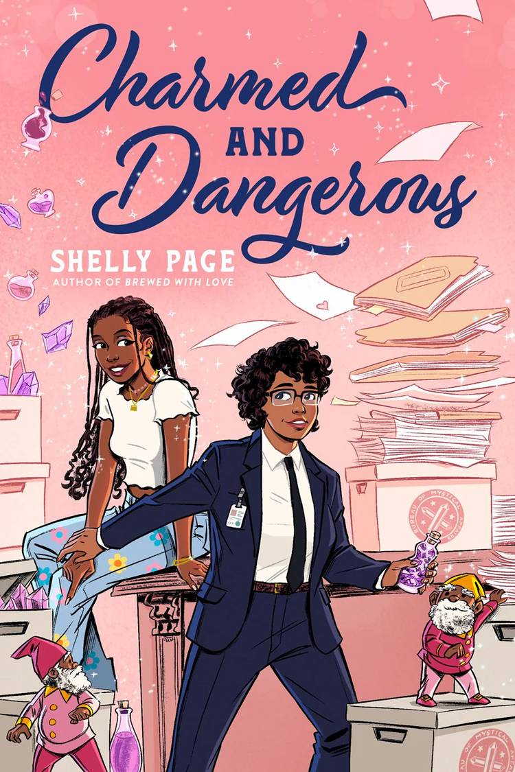 The book cover of Charmed and Dangerous by Shelly Page shows a femme black woman sitting on a desk and a masc black woman holding her hand