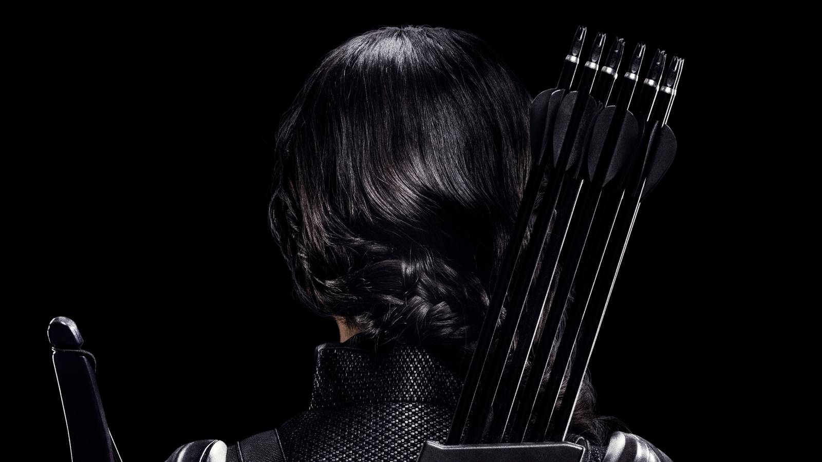 Jennifer Lawrence as Katniss Everdeen facing away from the camera in The Hunger Games: Mockingjay - Part 1 (2014)