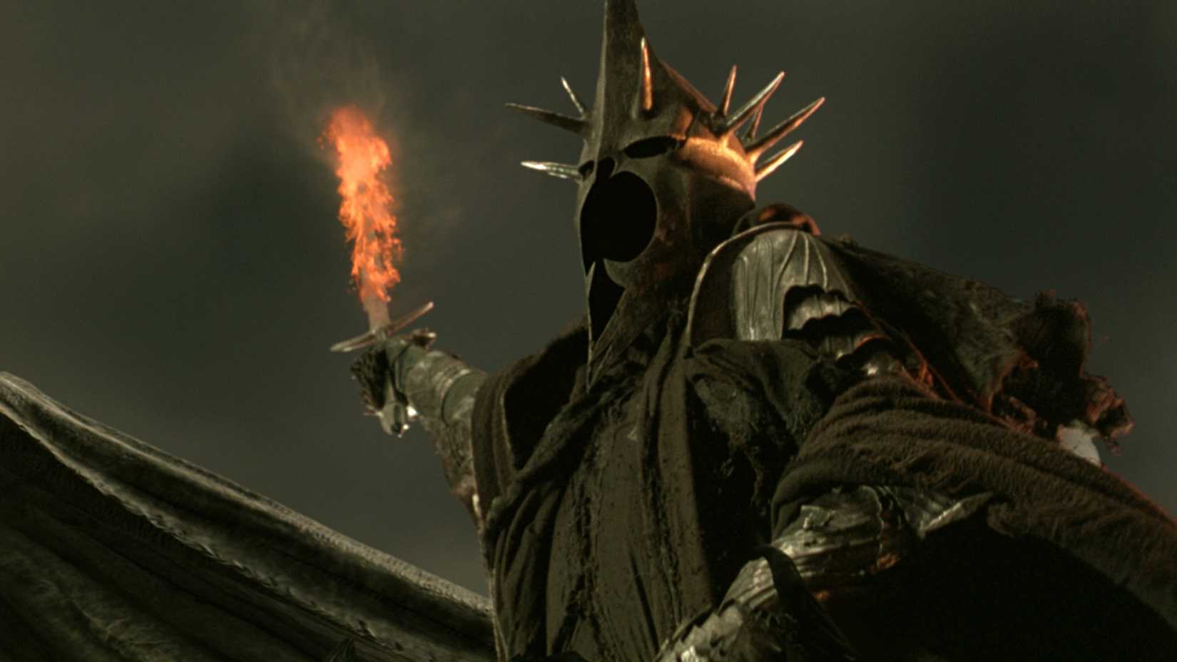 The Witch-king of Angmar raising a flaming sword in The Lord of the Rings: The Return of the King.