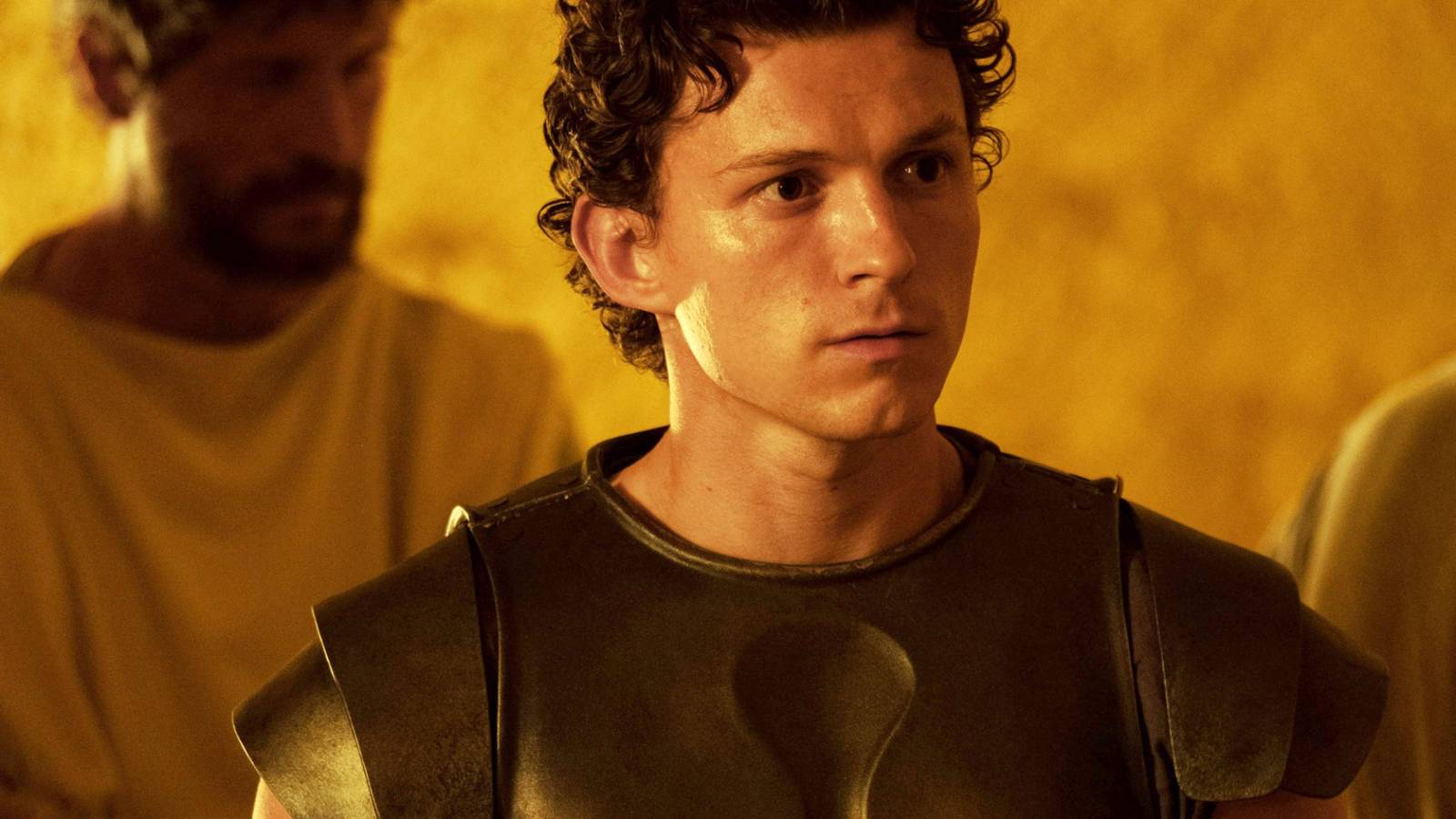 Tom Holland as Telemachus wearing armor in The Odyssey 2026
