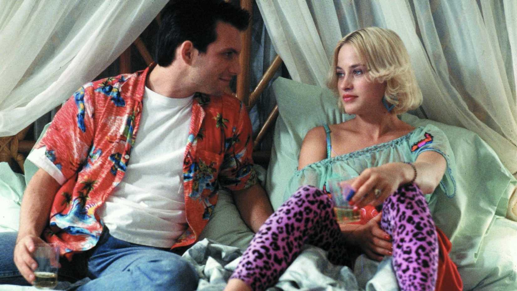 Alabama and Clarence sit in bed in True Romance