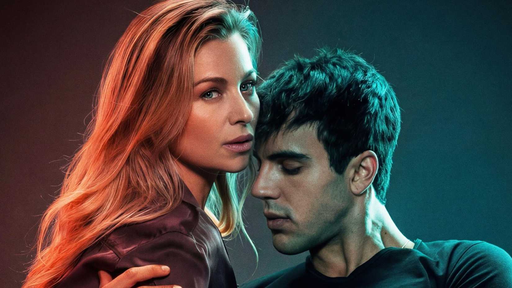 Two major characters from Desire looking intimate