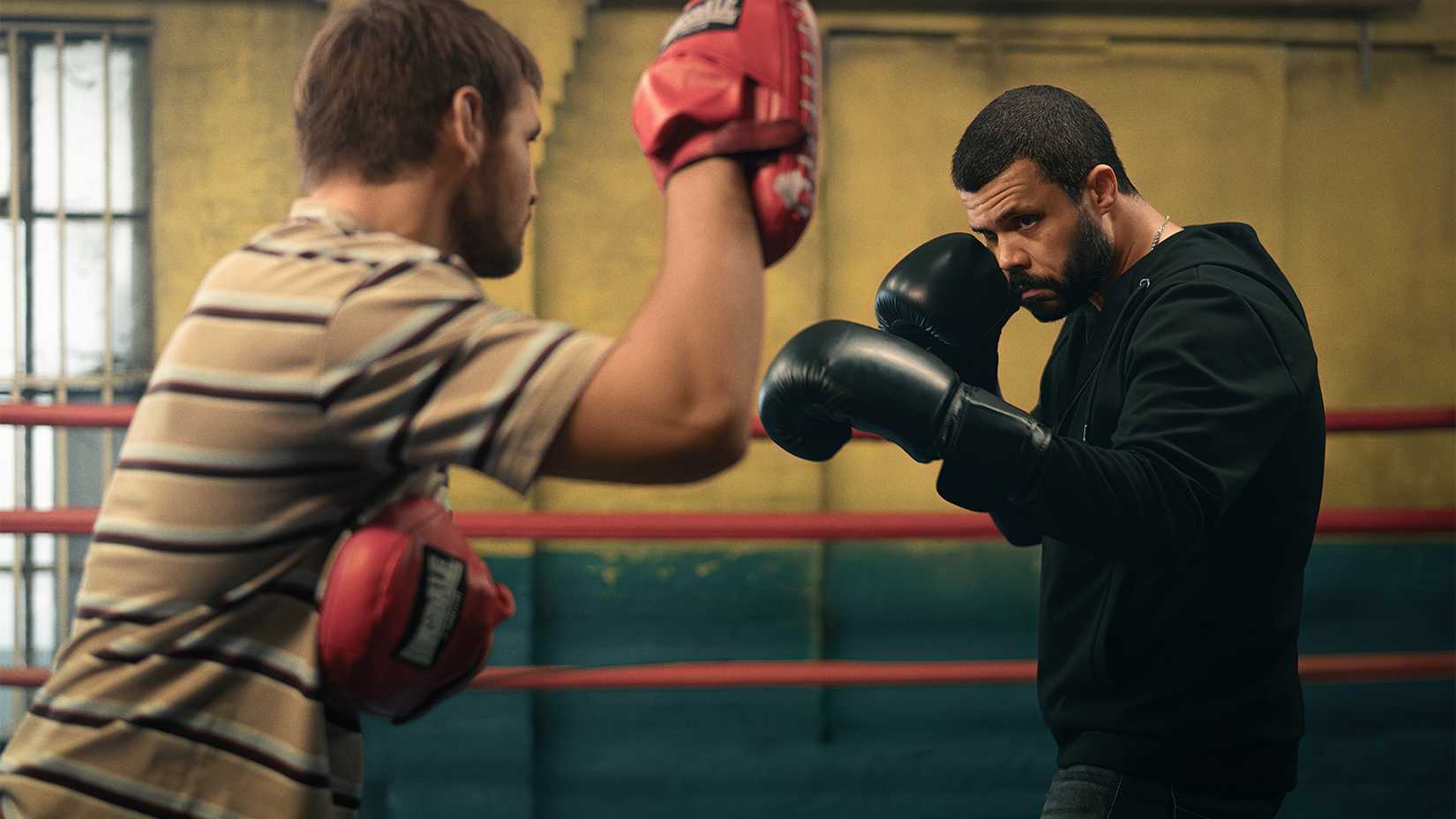 Tyler Conti (“Justin ‘Jay’ Hall”) and Howard Charles (“Maduka ‘Duke’ Kilroy”) in Fightland