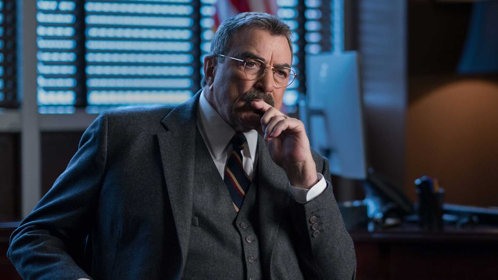 Tom Selleck as Frank Reagan looking thoughtful in Blue Bloods