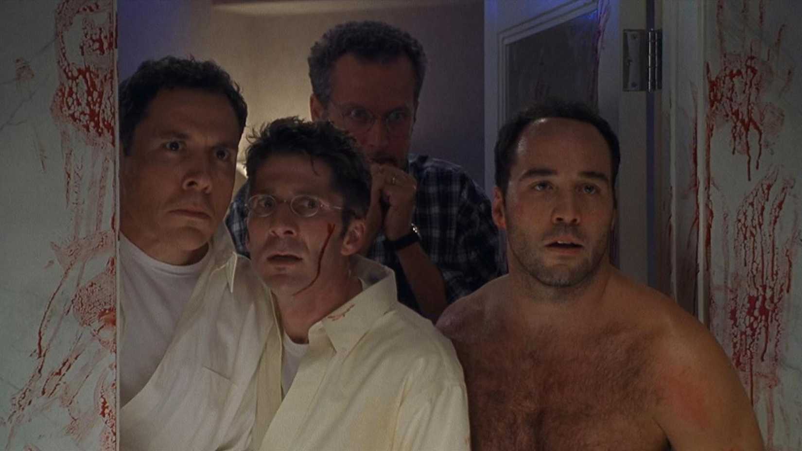 Four men look into a bloody room in Very Bad Things