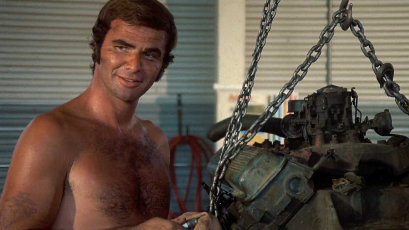 Burt Reynolds fixes an engine in White Lightning