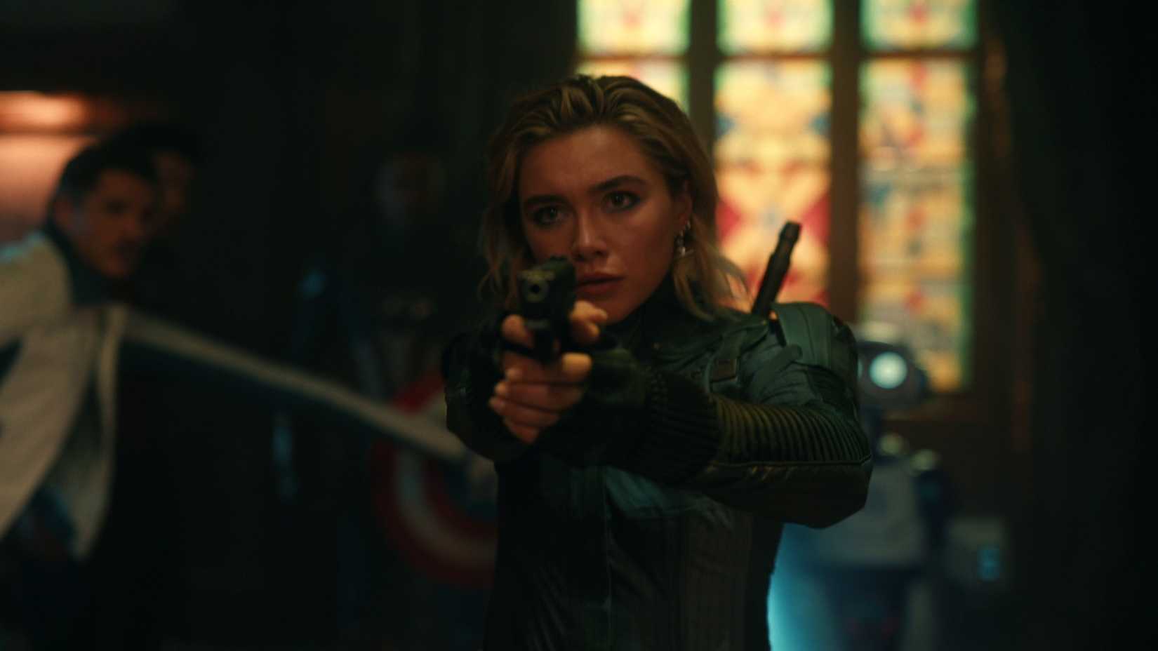 Yelena Belova with Reed Richards and Captain America behind her in Avengers: