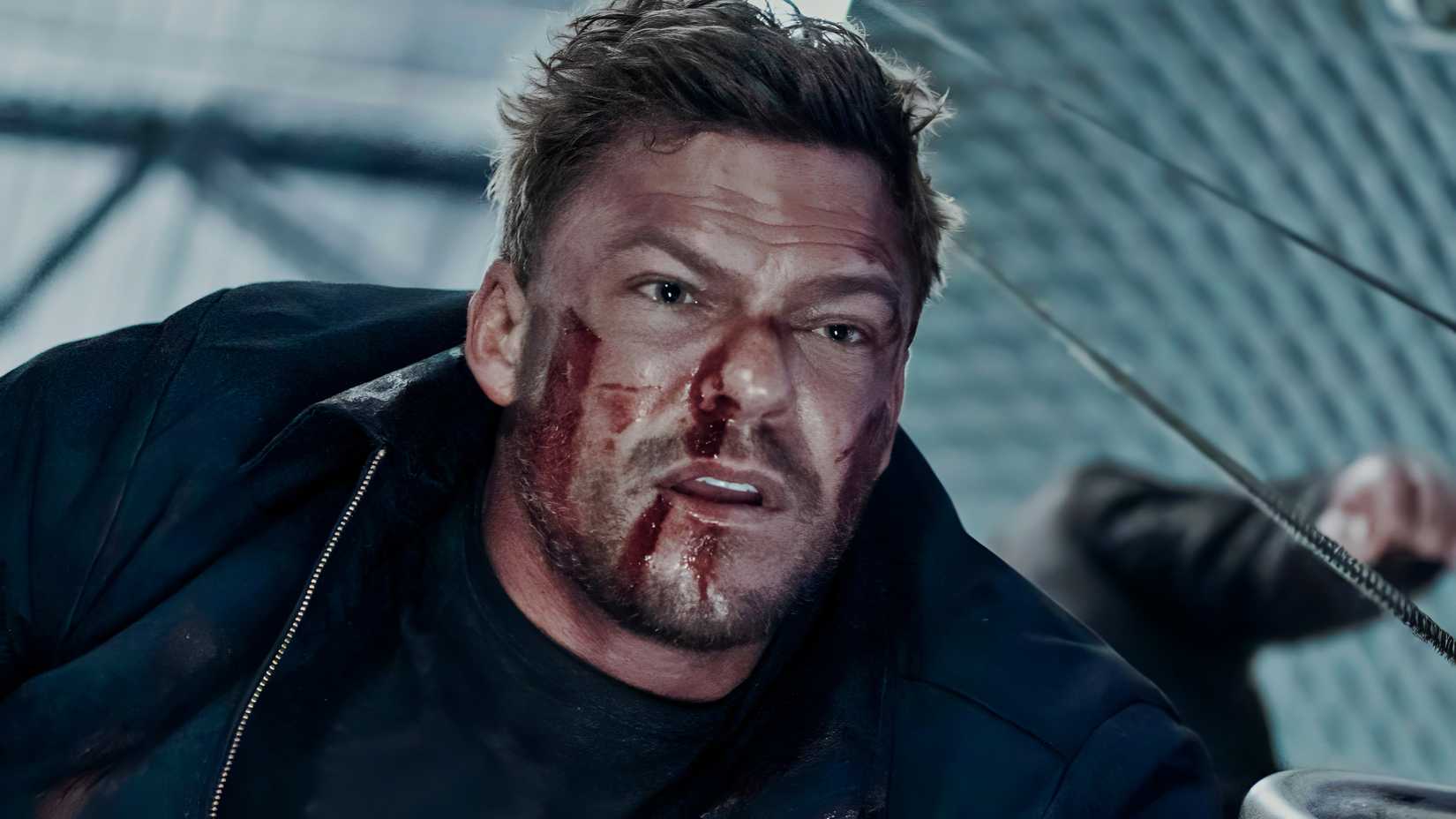 Alan Ritchson’s Jack Reacher looking beat down with blood on his face in Reacher season 2