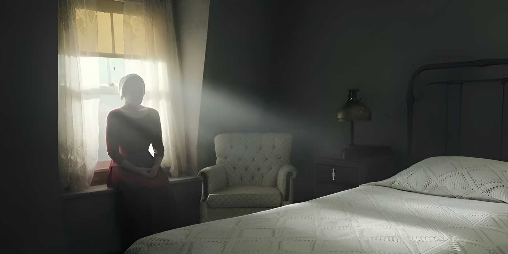 Elizabeth Moss’ Offred sitting in a room in Gilead in The Handmaid’s Tale