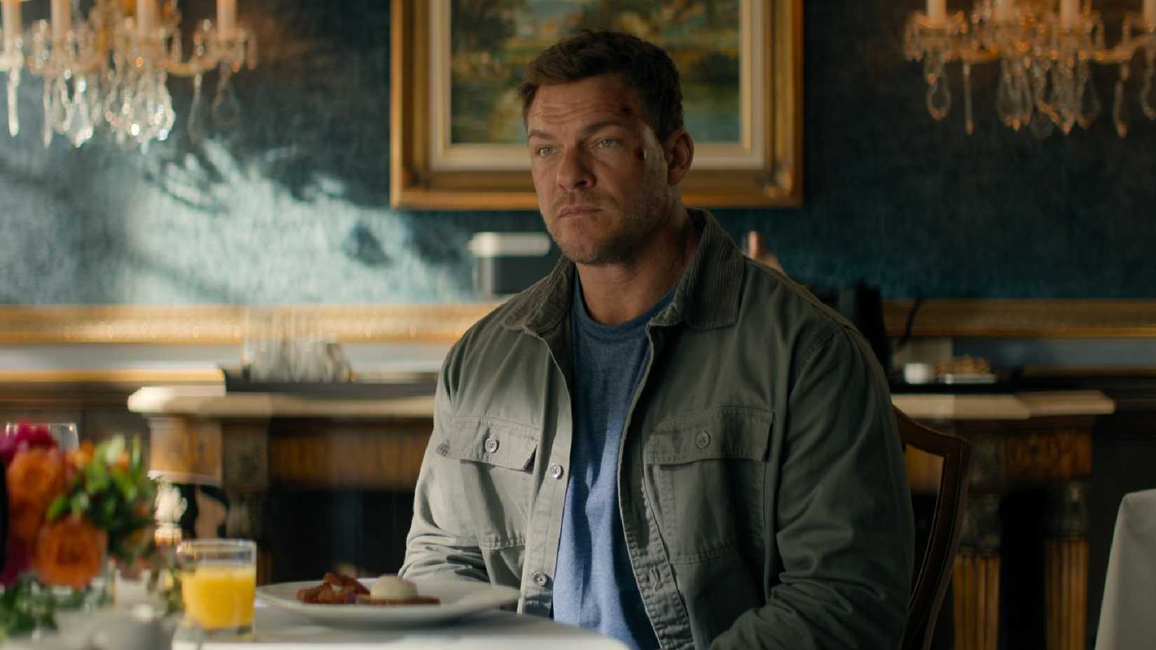 Alan Ritchson as Jack Reacher not enjoying breakfast.