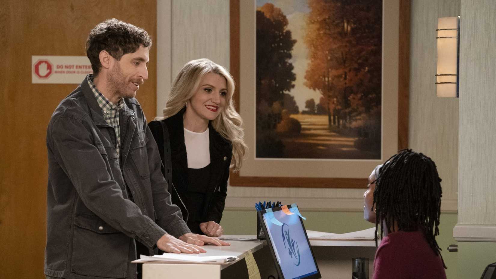 Main characters from B Positive in an office
