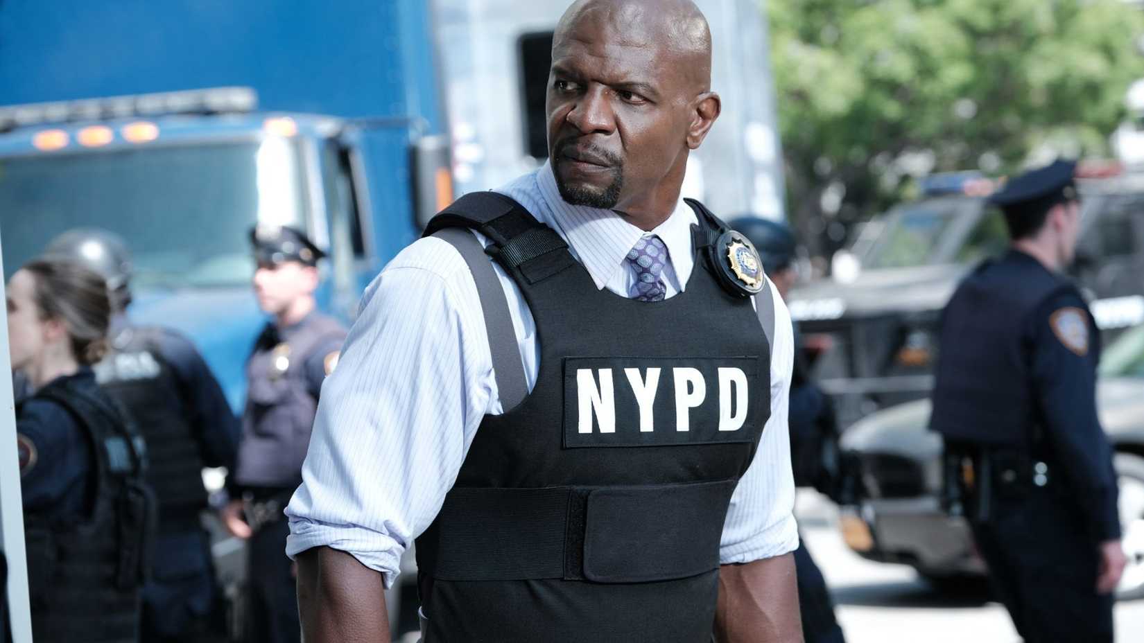 Terry from Brooklyn Nine-Nine wearing a bulletproof vest