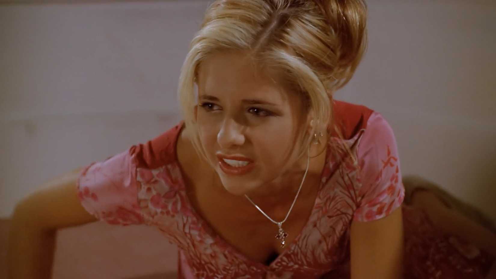 Buffy Summers crying on the floor in the Buffy the Vampire Slayer episode "Dead Man's Party."