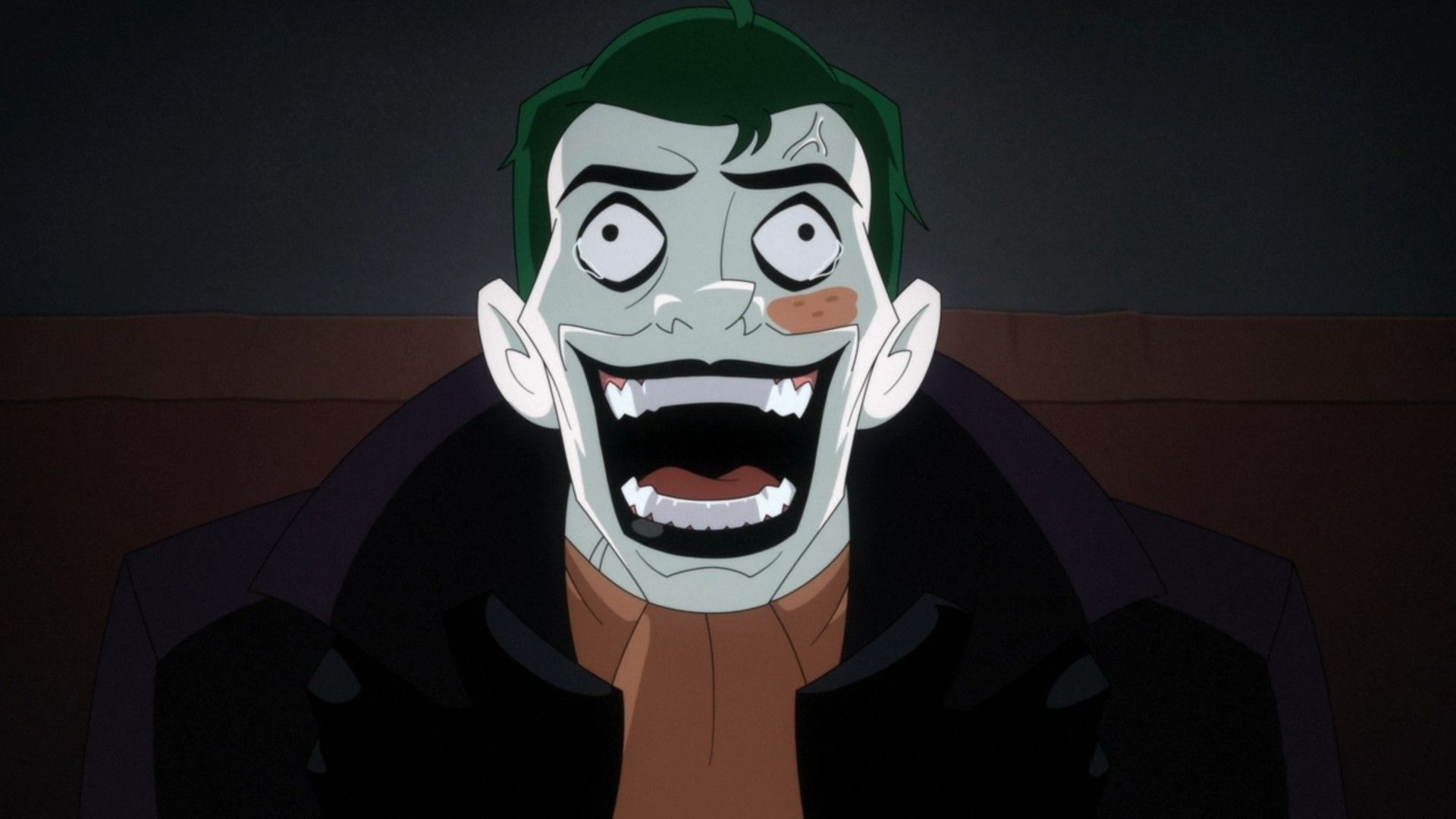 A mob goon dressed like Joker dying from laughing gas in Batman: Caped Crusader.