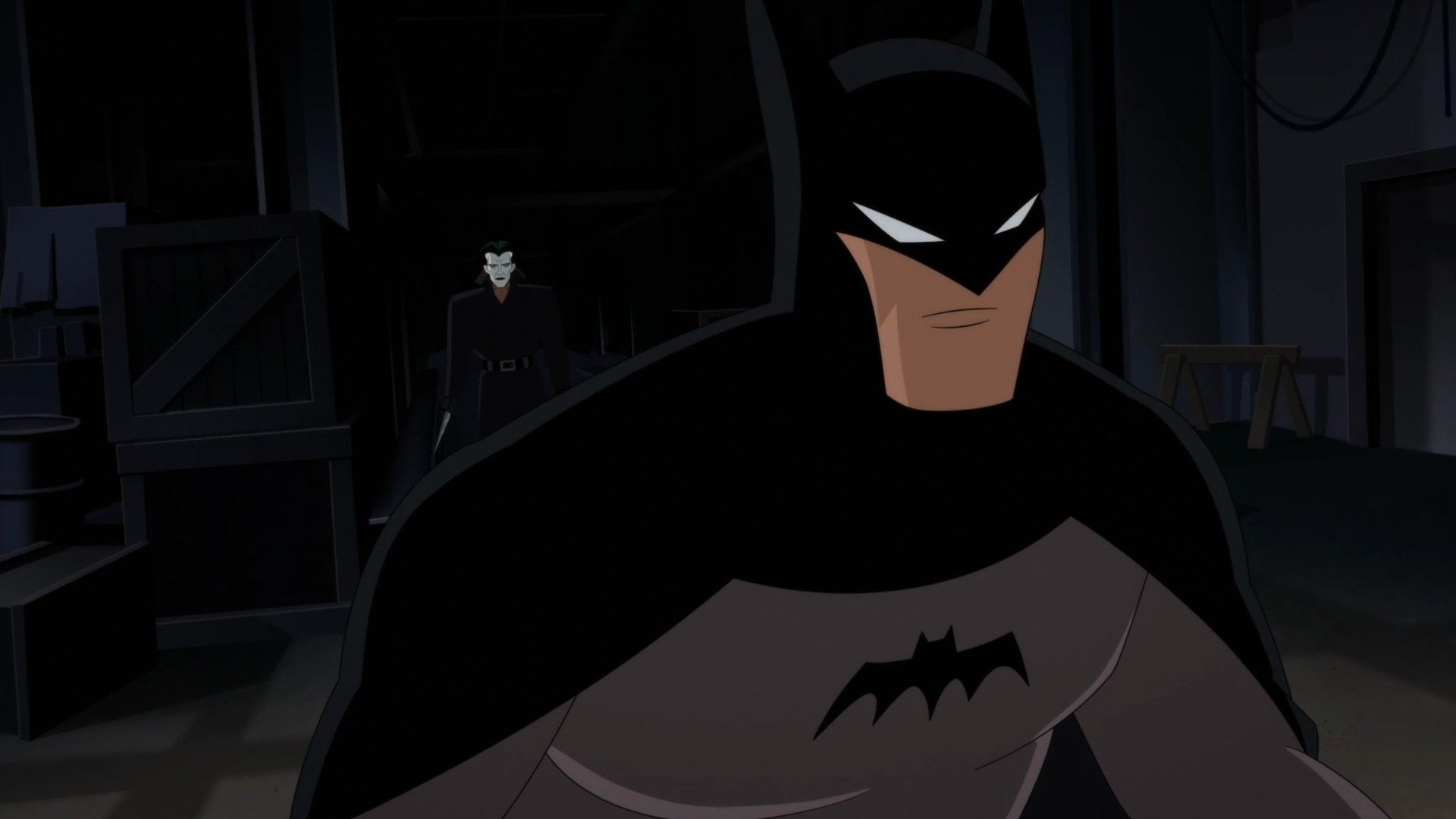 Joker sneaking up behind Batman in Batman: Caped Crusader.