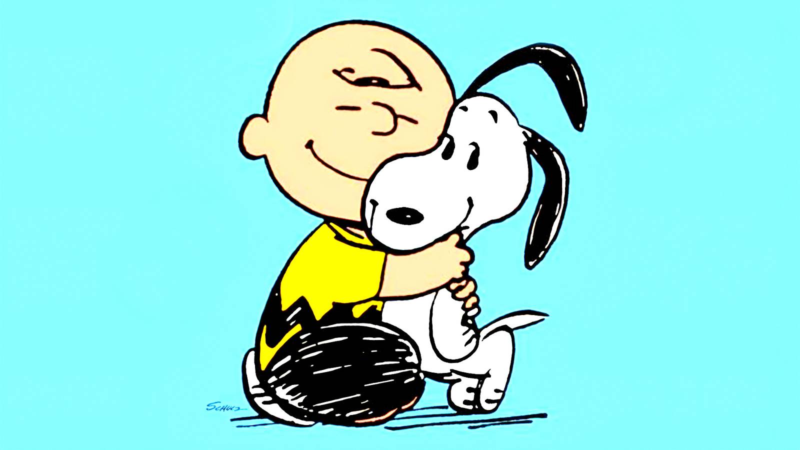 Charlie Brown hugs Snoopy in Peanuts comic art