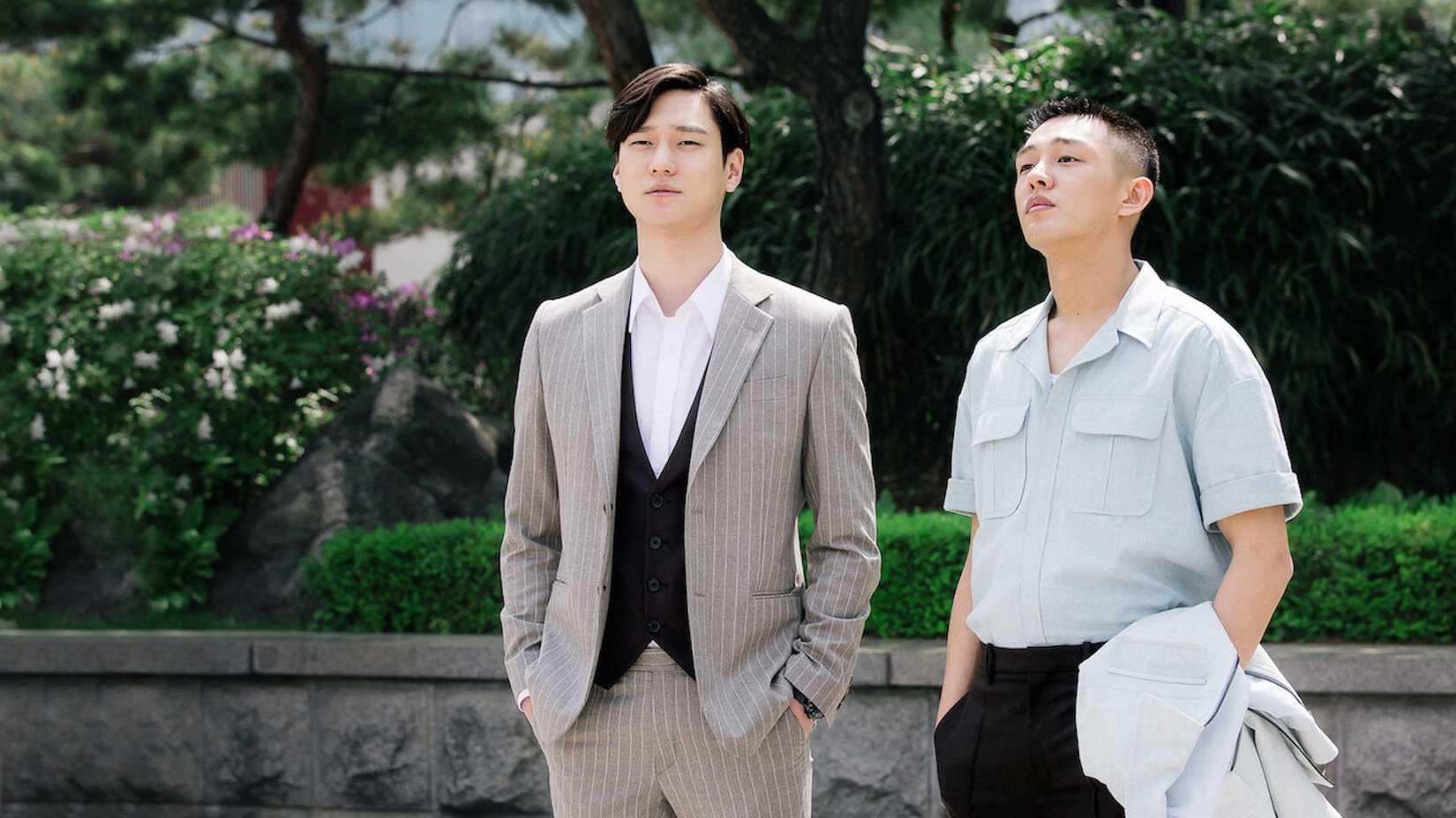 Two men looking into the distance in Chicago Typewriter.