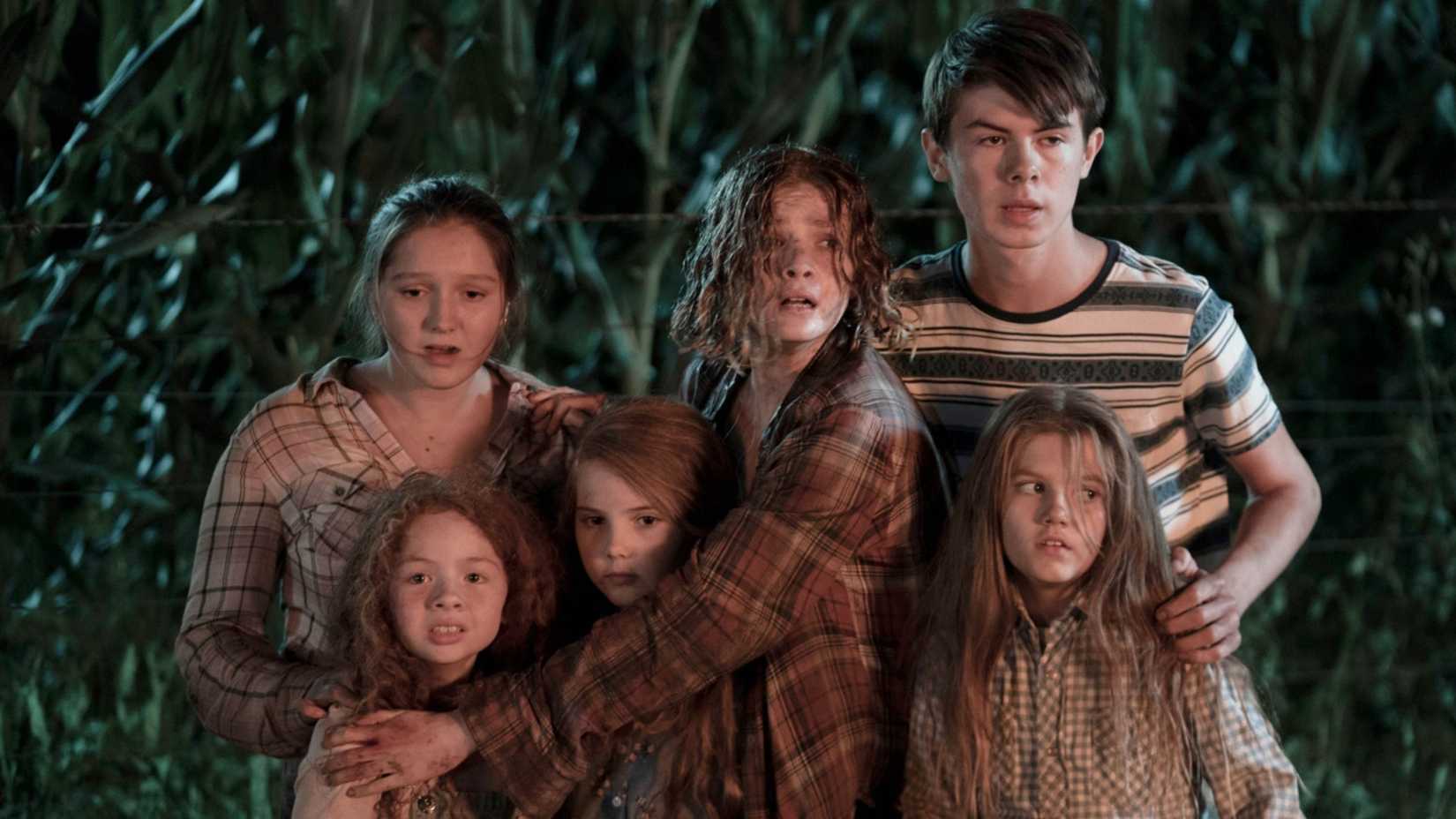 Kids cower in fear in the Children of the Corn remake.