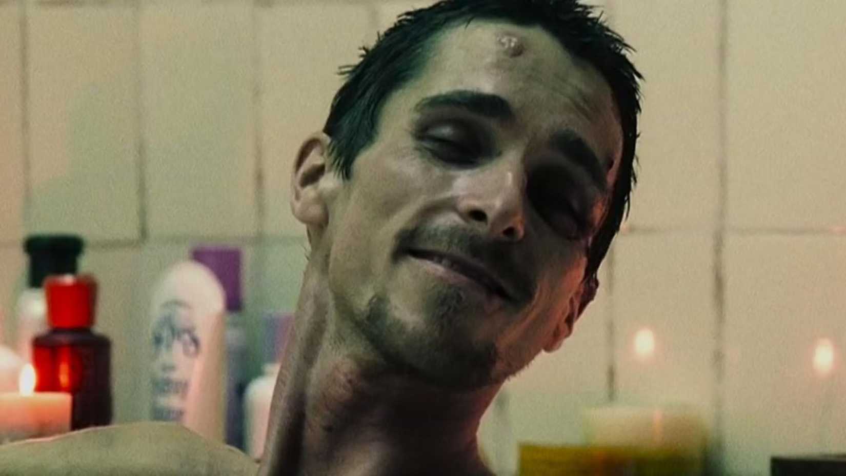 Christian Bale smiling in The Machinist