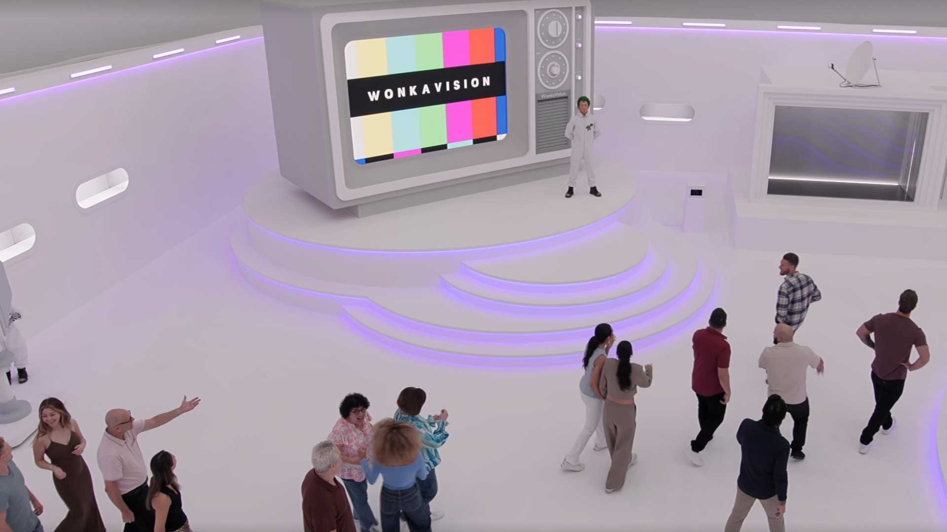 Contestants walking into a room for WonkaVision in The Golden Ticket