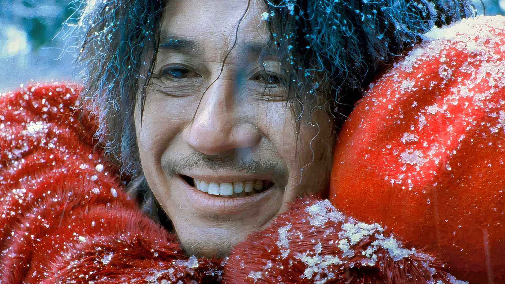 Dae-su smiles as he hugs Mi-do in the ending of Oldboy