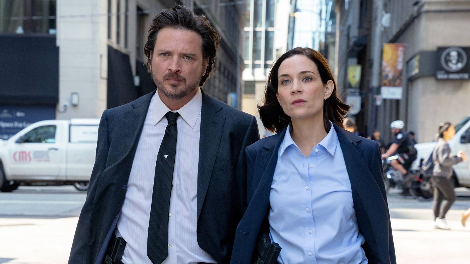 Detectives Graff and Bateman walking down the street in Law & Order Toronto_ Criminal Intent