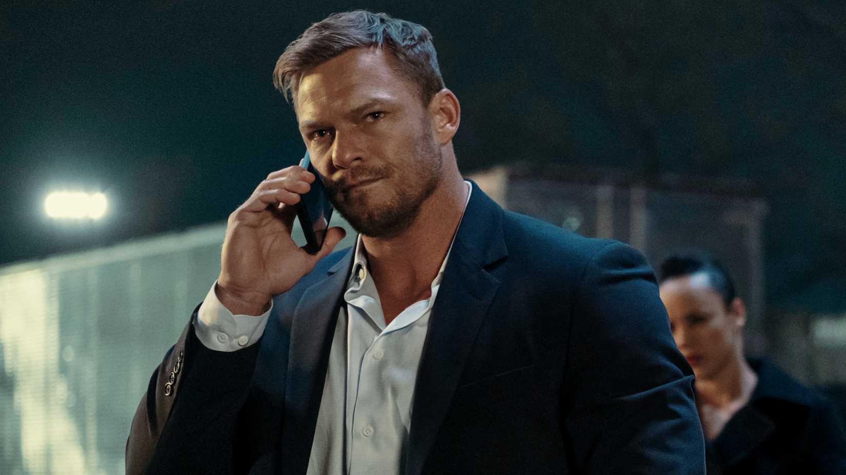 Alan Ritchson’s Jack Reacher talking on the phone in Reacher season 2
