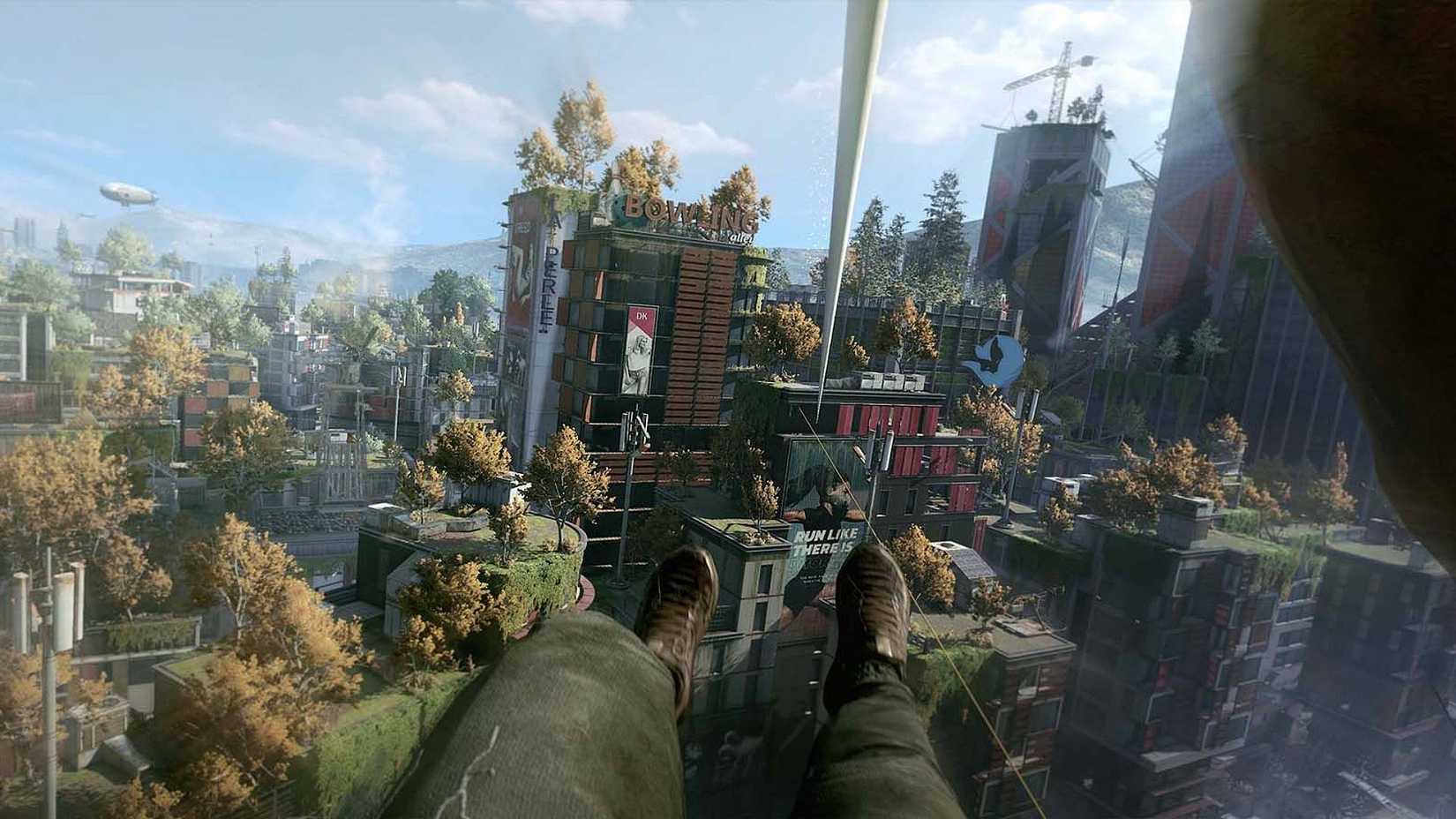 The player using a zipline to get to a distant skyscraper in Dying Light 2.