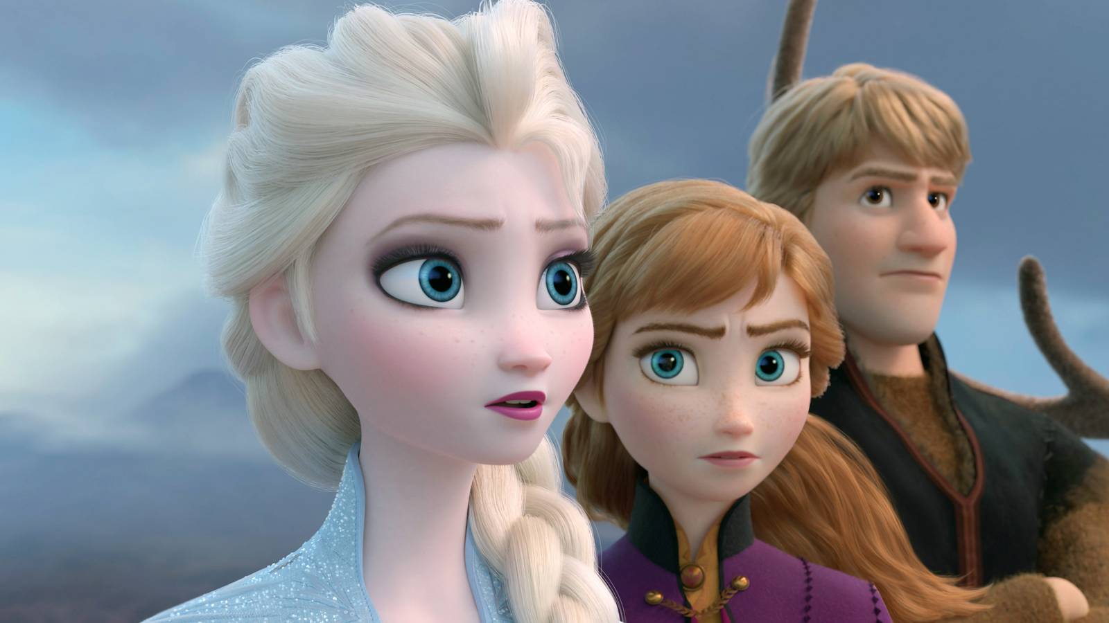 Elsa, Anna and Kristoff looking into the distance in Frozen 2